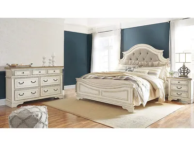 Realyn King Upholstered Panel Bed and Dresser