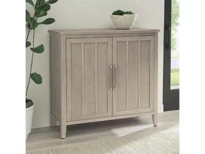 Camden Two Door Two Drawer Bar Cabinet with Stemware Rack and Wine Rack in Chai