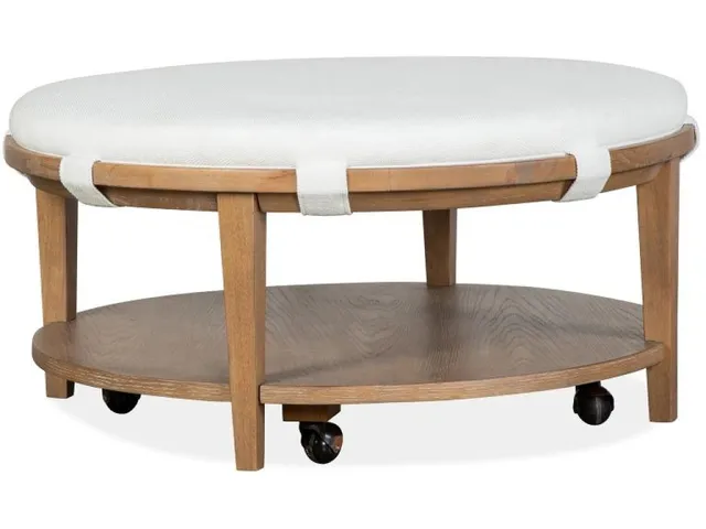 Round Cocktail Table with White Uph. Top and Casters